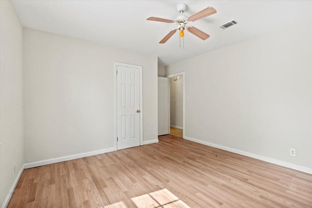 2436 Juniper Dr, Augusta, GA 30906 - unfurnished bedroom featuring light wood finished floors, baseboards, and ceiling fan