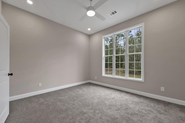 carpeted empty room with ceiling fan