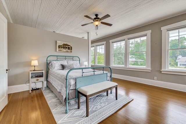 413 S Liberty St, Waynesboro, GA 30830 - bedroom featuring wood finished floors, baseboards, and ceiling fan