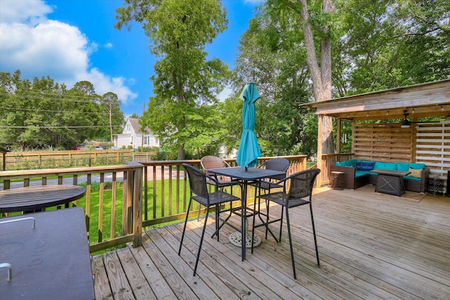 413 S Liberty St, Waynesboro, GA 30830 - wooden deck with an outdoor hangout area, outdoor dining space, and ceiling fan