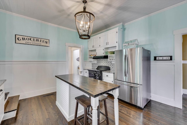 413 S Liberty St, Waynesboro, GA 30830 - kitchen featuring freestanding refrigerator, range, open shelves, ventilation hood, and ornamental molding