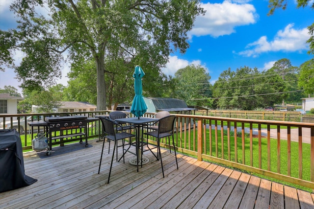 413 S Liberty St, Waynesboro, GA 30830 - wooden deck with outdoor dining area