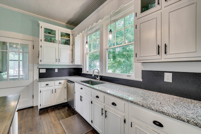413 S Liberty St, Waynesboro, GA 30830 - kitchen featuring a sink, dishwasher, ornamental molding, dark wood finished floors, and white cabinets