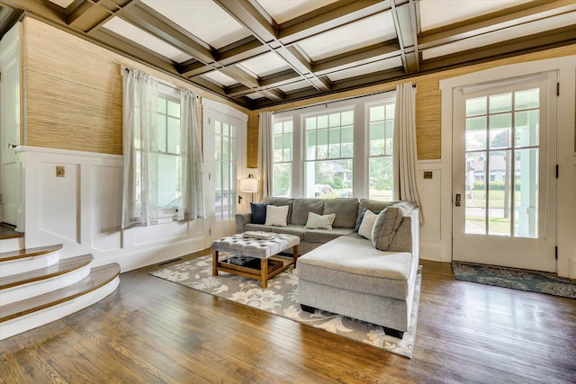 413 S Liberty St, Waynesboro, GA 30830 - living area featuring beam ceiling, a decorative wall, hardwood / wood-style flooring, a wainscoted wall, and coffered ceiling