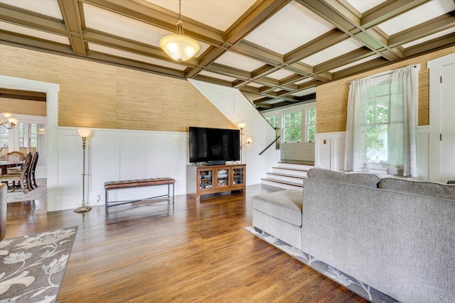 413 S Liberty St, Waynesboro, GA 30830 - living room with coffered ceiling, a decorative wall, wood finished floors, plenty of natural light, and beam ceiling