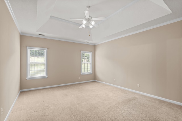 703 Talon Ct, Evans, GA 30809 - empty room with a tray ceiling, light colored carpet, ornamental molding, baseboards, and ceiling fan