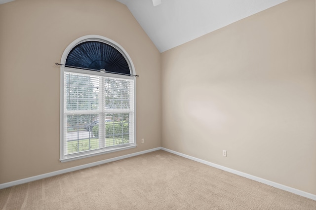 703 Talon Ct, Evans, GA 30809 - spare room featuring healthy amount of natural light, carpet flooring, vaulted ceiling, and baseboards