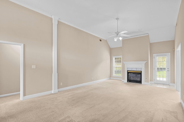 703 Talon Ct, Evans, GA 30809 - unfurnished living room featuring light carpet, ceiling fan, baseboards, high vaulted ceiling, and plenty of natural light