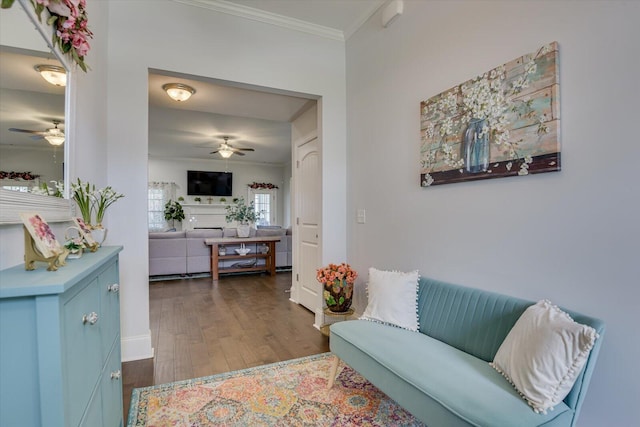 interior space with dark hardwood / wood-style floors and ornamental molding