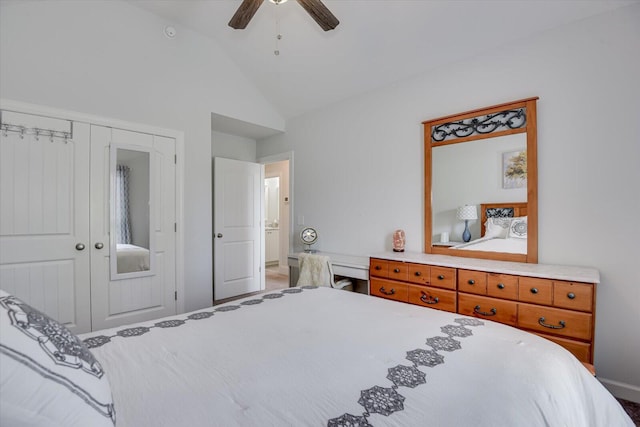 bedroom featuring a closet, ceiling fan, and lofted ceiling