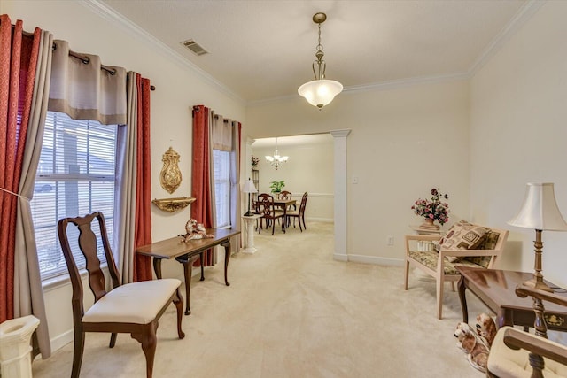 sitting room featuring crown molding, an inviting chandelier, light colored carpet, baseboards, and visible vents