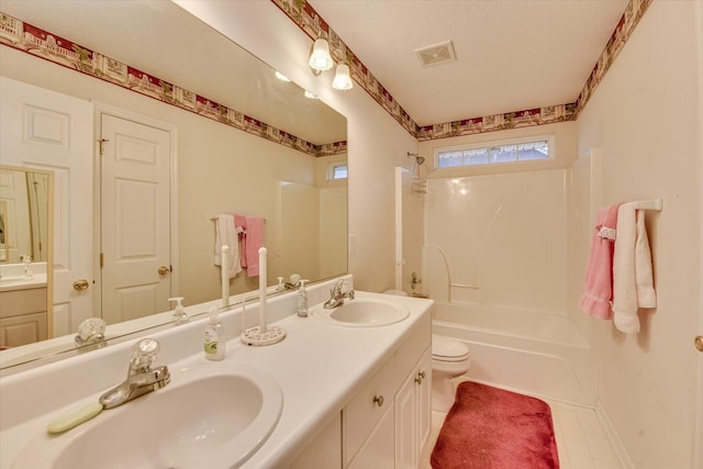 full bath with shower / bathing tub combination, double vanity, visible vents, and a sink