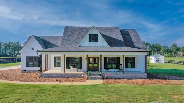 45 Old Friar Rd, Aiken, SC 29801 - modern inspired farmhouse featuring covered porch, a storage shed, and a shingled roof