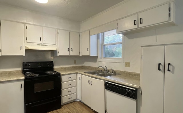 kitchen featuring white cabinets, black range with electric cooktop, white dishwasher, and sink