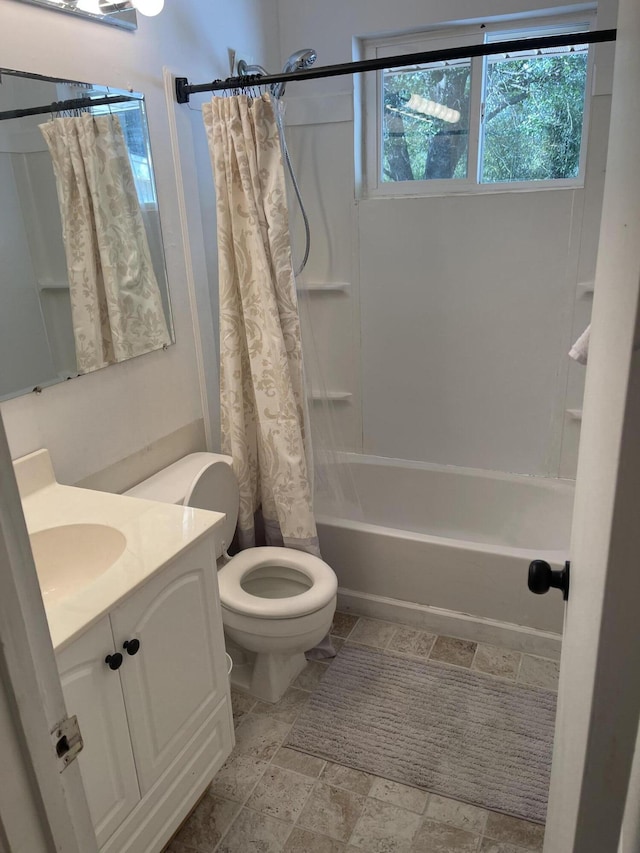 3410 Crane Ferry Rd, Augusta, GA 30907 - full bath with vanity, stone finish flooring, shower / bath combination with curtain, and toilet