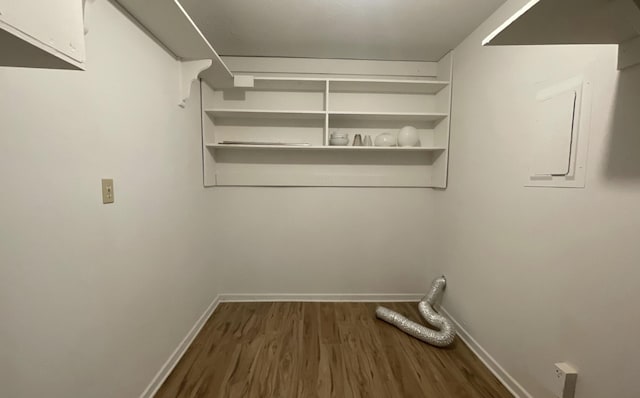 laundry area featuring dark hardwood / wood-style floors