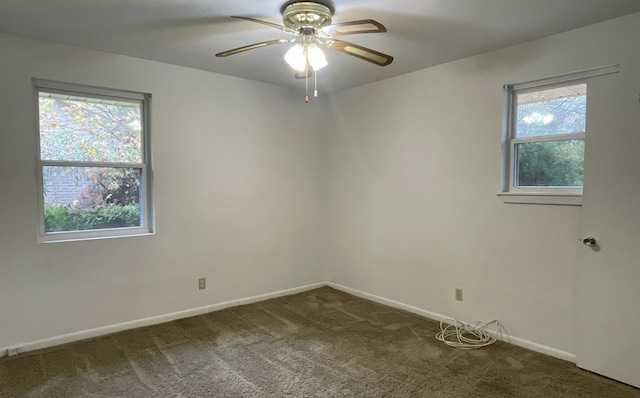 carpeted empty room with ceiling fan