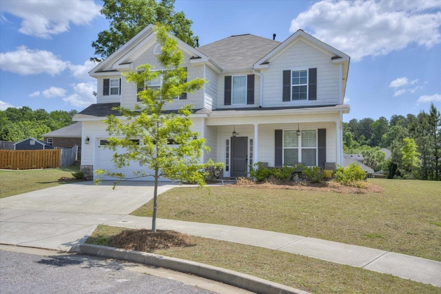 203 Preston Ct, North Augusta, SC 29860 - view of front of home featuring concrete driveway, fence, a front lawn, and a garage
