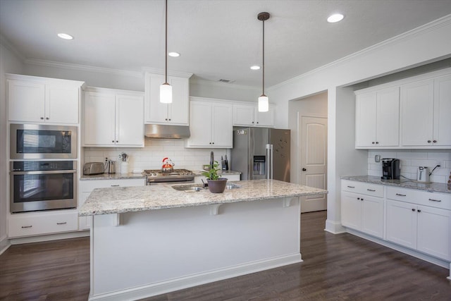 203 Preston Ct, North Augusta, SC 29860 - kitchen with under cabinet range hood, white cabinetry, appliances with stainless steel finishes, and tasteful backsplash