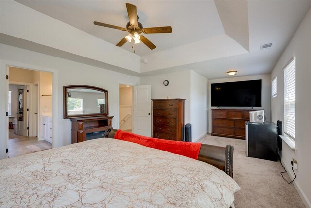 203 Preston Ct, North Augusta, SC 29860 - bedroom featuring visible vents, ensuite bath, and light colored carpet