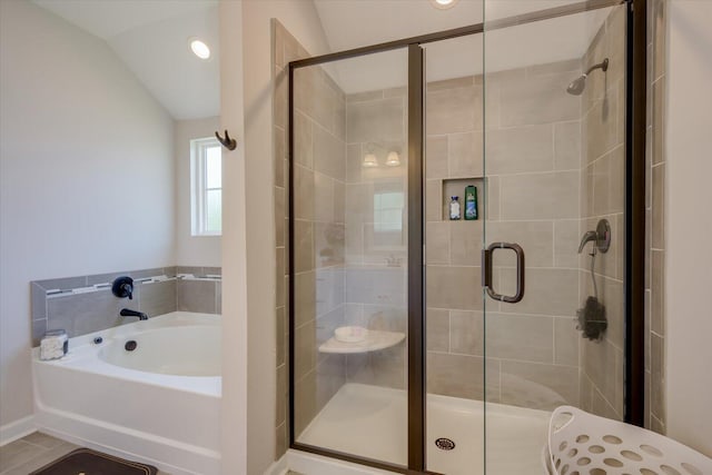 203 Preston Ct, North Augusta, SC 29860 - full bath featuring vaulted ceiling, a shower stall, and a bath