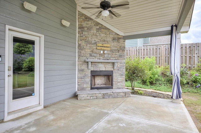 215 Palisades Rdg, Evans, GA 30809 - view of patio / terrace featuring an outdoor stone fireplace and ceiling fan