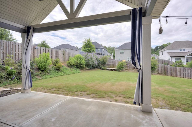 215 Palisades Rdg, Evans, GA 30809 - view of yard featuring a patio and a residential view