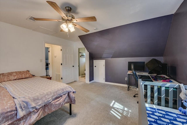 bedroom with attic access, light colored carpet, vaulted ceiling, and baseboards