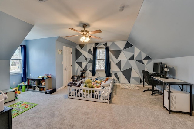 carpeted bedroom with lofted ceiling, multiple windows, and baseboards