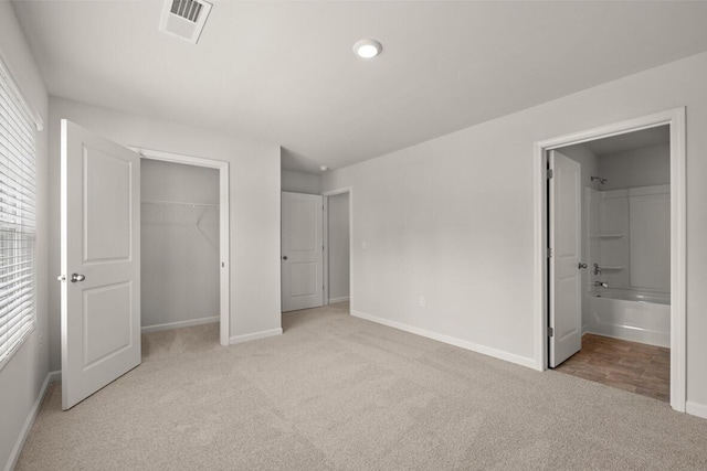 1256 Birch Cir, Grovetown, GA 30813 - unfurnished bedroom featuring light carpet, baseboards, a closet, and ensuite bath