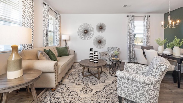 1256 Birch Cir, Grovetown, GA 30813 - living area featuring a chandelier, plenty of natural light, wood finished floors, and baseboards