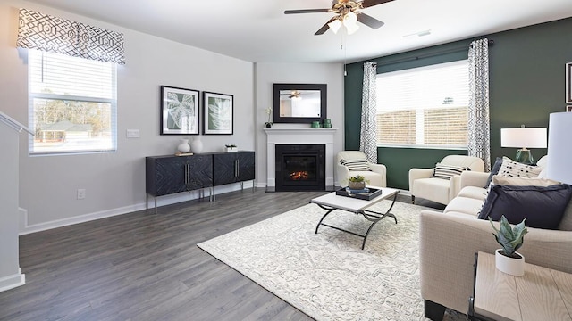 1256 Birch Cir, Grovetown, GA 30813 - living room with ceiling fan, wood finished floors, a lit fireplace, and baseboards