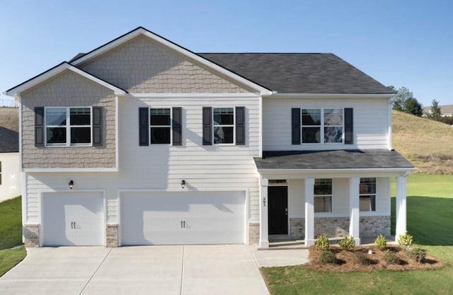 1256 Birch Cir, Grovetown, GA 30813 - craftsman-style home featuring a garage, a porch, concrete driveway, a front lawn, and stone siding