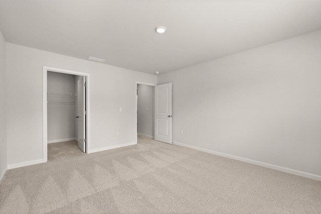 1256 Birch Cir, Grovetown, GA 30813 - unfurnished bedroom with light carpet, baseboards, a closet, and a spacious closet