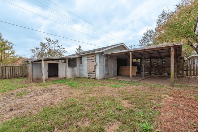 exterior space featuring an outbuilding