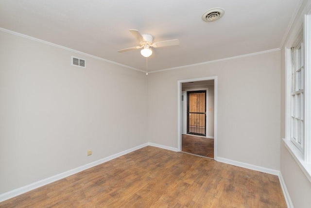 unfurnished room featuring crown molding, ceiling fan, and wood-type flooring