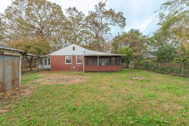 view of yard with a sunroom