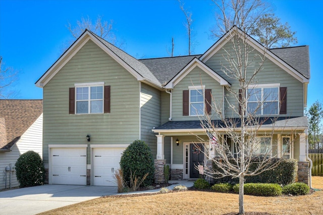 view of front of property with a garage