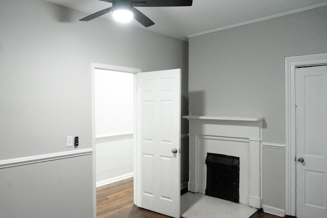 413 2nd St, Augusta, GA 30901 - unfurnished living room featuring a ceiling fan, a fireplace, wood finished floors, and ornamental molding