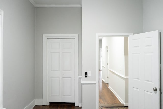 413 2nd St, Augusta, GA 30901 - unfurnished bedroom featuring ornamental molding, dark wood-style floors, a closet, and baseboards