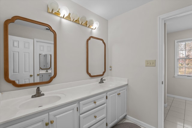 bathroom with vanity and tile patterned floors