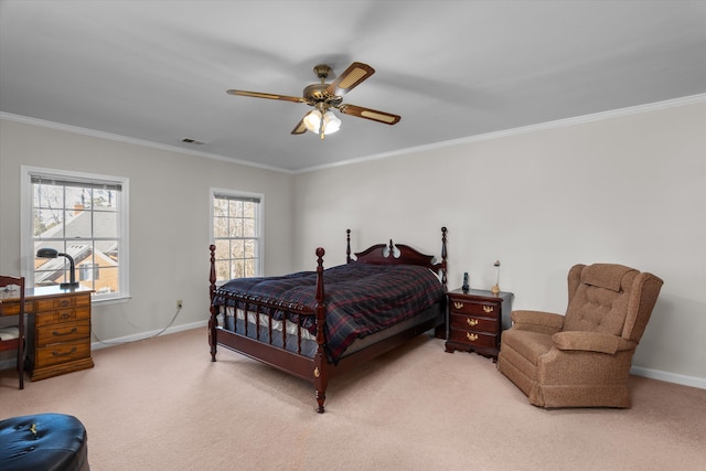 bedroom with crown molding, ceiling fan, and carpet flooring