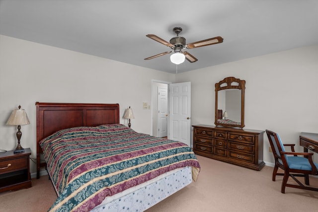 bedroom with light carpet and ceiling fan