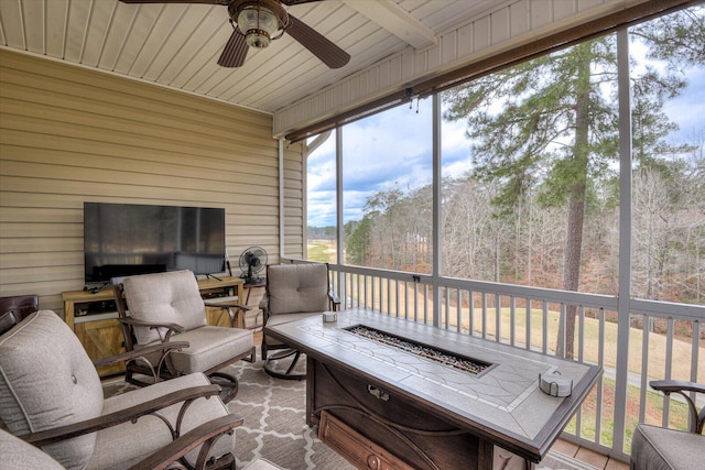 sunroom / solarium with ceiling fan