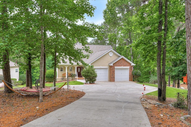 single story home with a garage