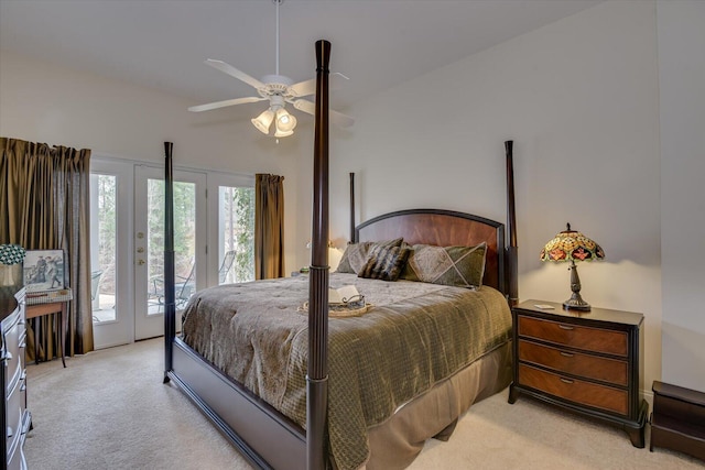 carpeted bedroom featuring access to exterior, ceiling fan, and vaulted ceiling