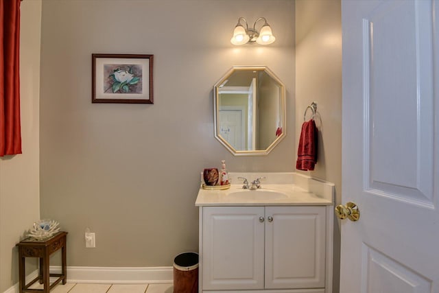 bathroom with tile patterned floors and vanity