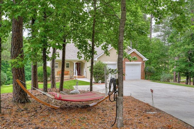 view of front of house featuring covered porch and a garage