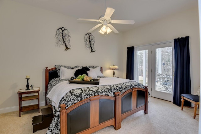 bedroom featuring access to outside, ceiling fan, and light carpet