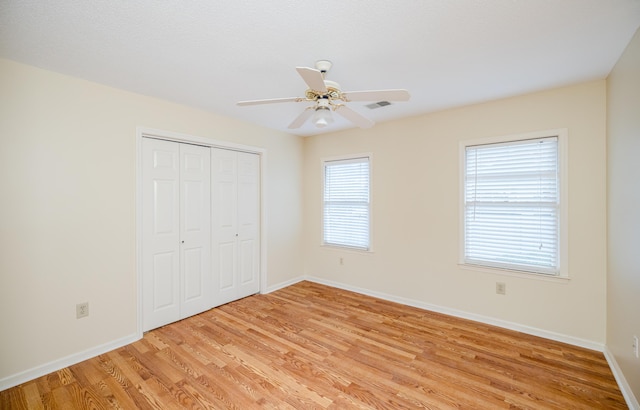 3701 Wexford Dr, Martinez, GA 30907 - unfurnished bedroom featuring light wood-type flooring, a closet, and a ceiling fan